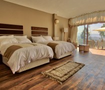 Established in 2019, Gondar Hills Resort is high on a hill with 360° views of the town and its surroundings. The resort, at the end of a winding cobbled drive, has been designed so its cottages, restaurant, swimming pool and gardens all have eye-catching views. 

The 33 en-suite